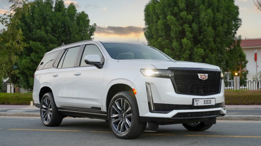 White Cadillac Escalade - Rent a Cadillac Escalade from Four Seasons Car Rental