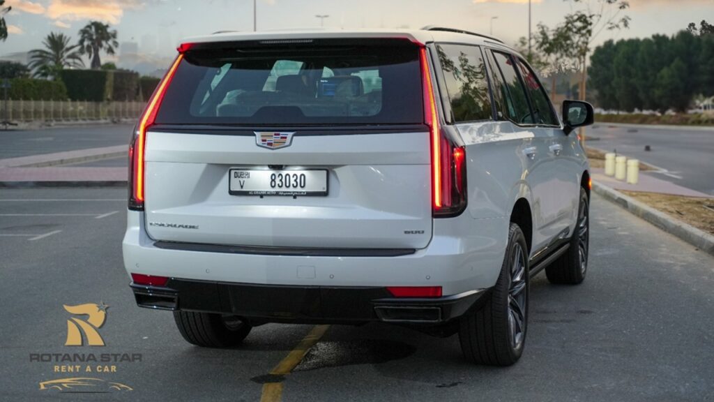 White Cadillac Escalade - Rent a Cadillac Escalade from Four Seasons Car Rental