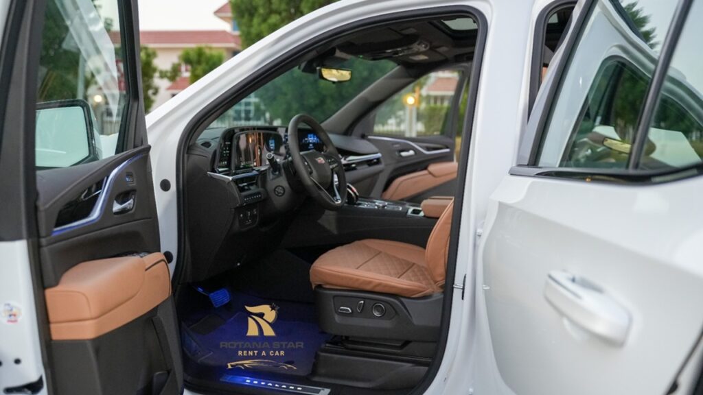 White Cadillac Escalade - Rent a Cadillac Escalade from Four Seasons Car Rental