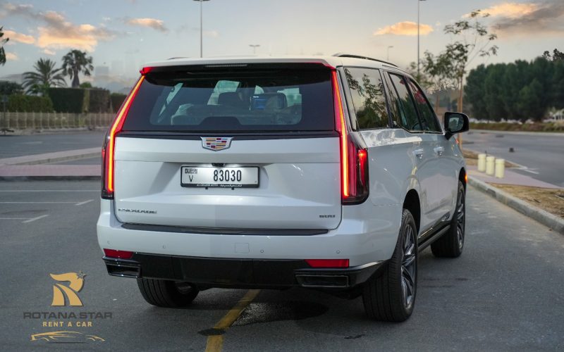 White Cadillac Escalade - Rent a Cadillac Escalade from Four Seasons Car Rental